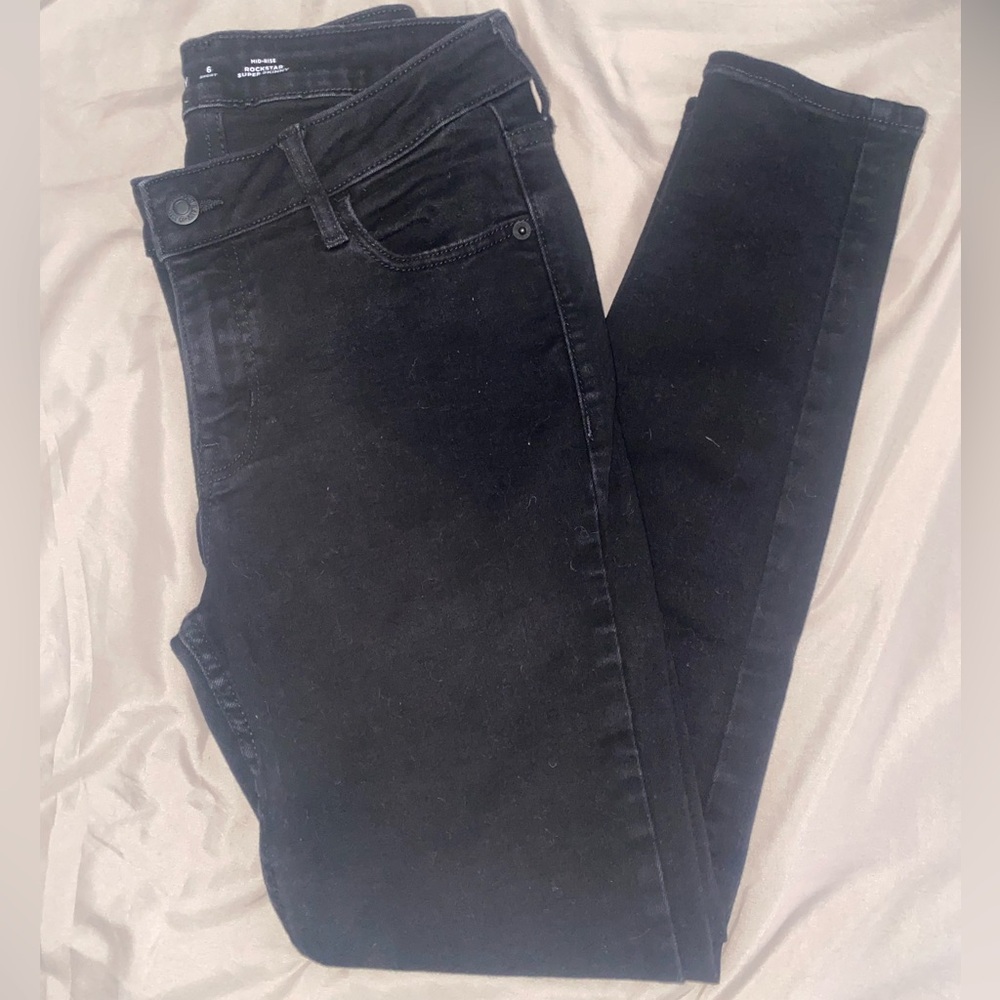 Rockstar Super Skinny - Mid Rise Jeans